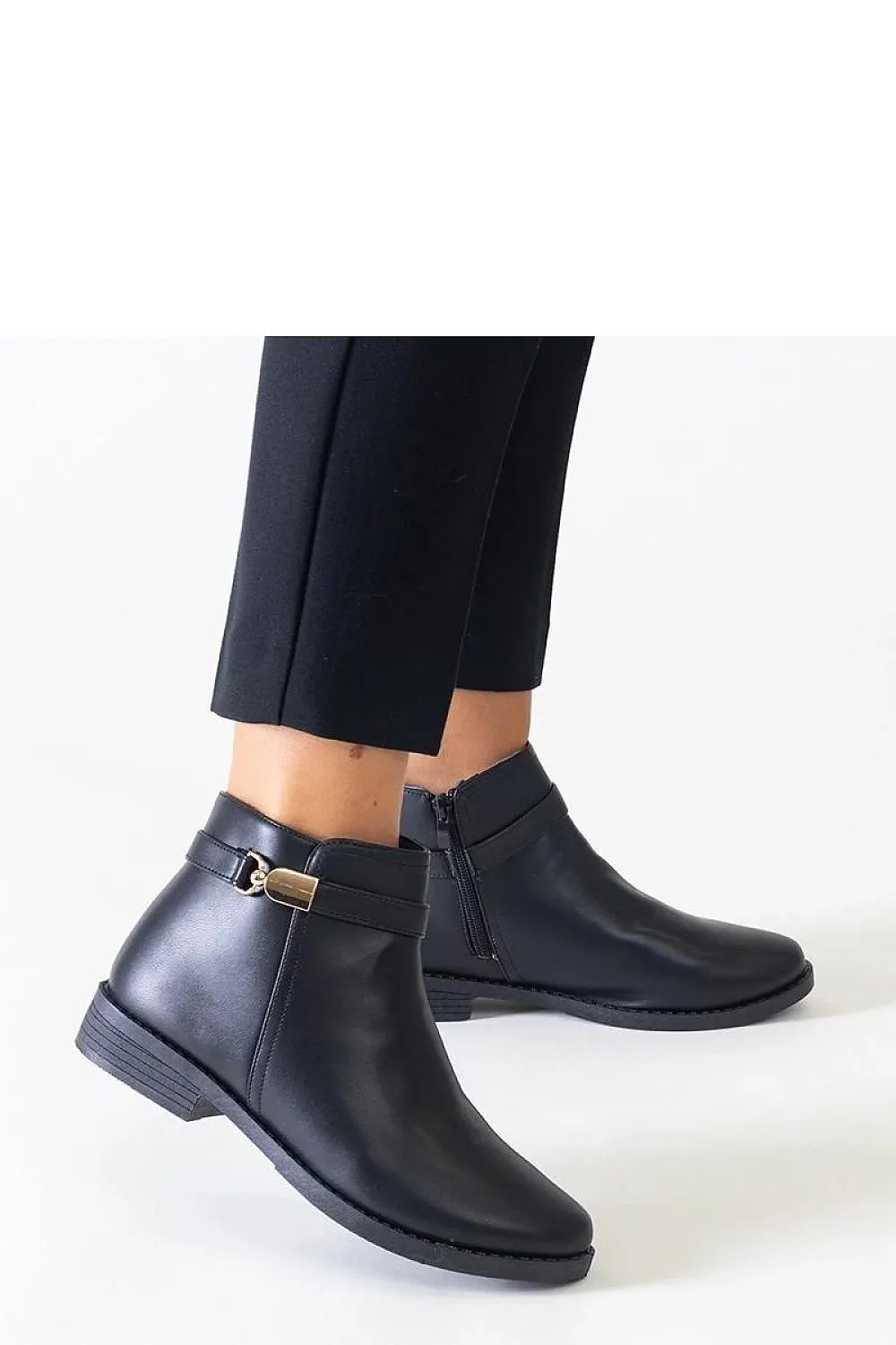 Black ankle boots with gold inserts
