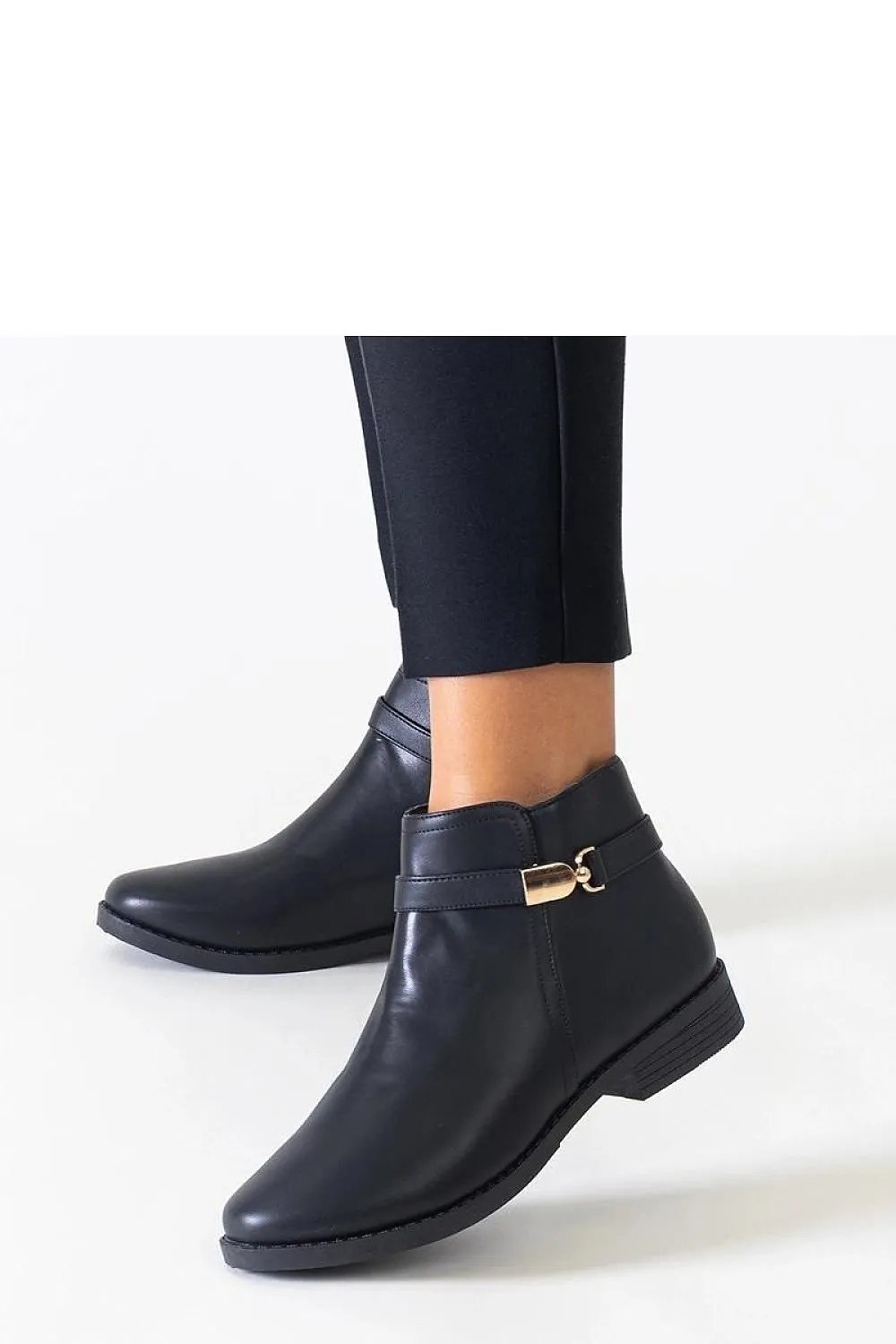 Black ankle boots with gold inserts
