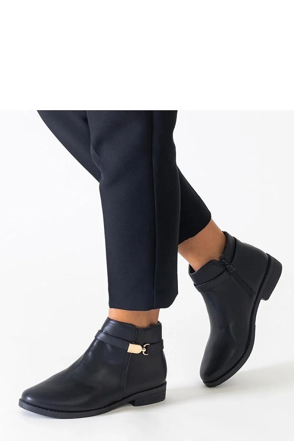 Black ankle boots with gold inserts